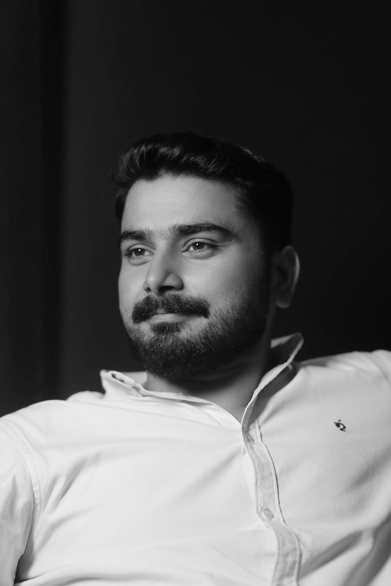 M. Adil